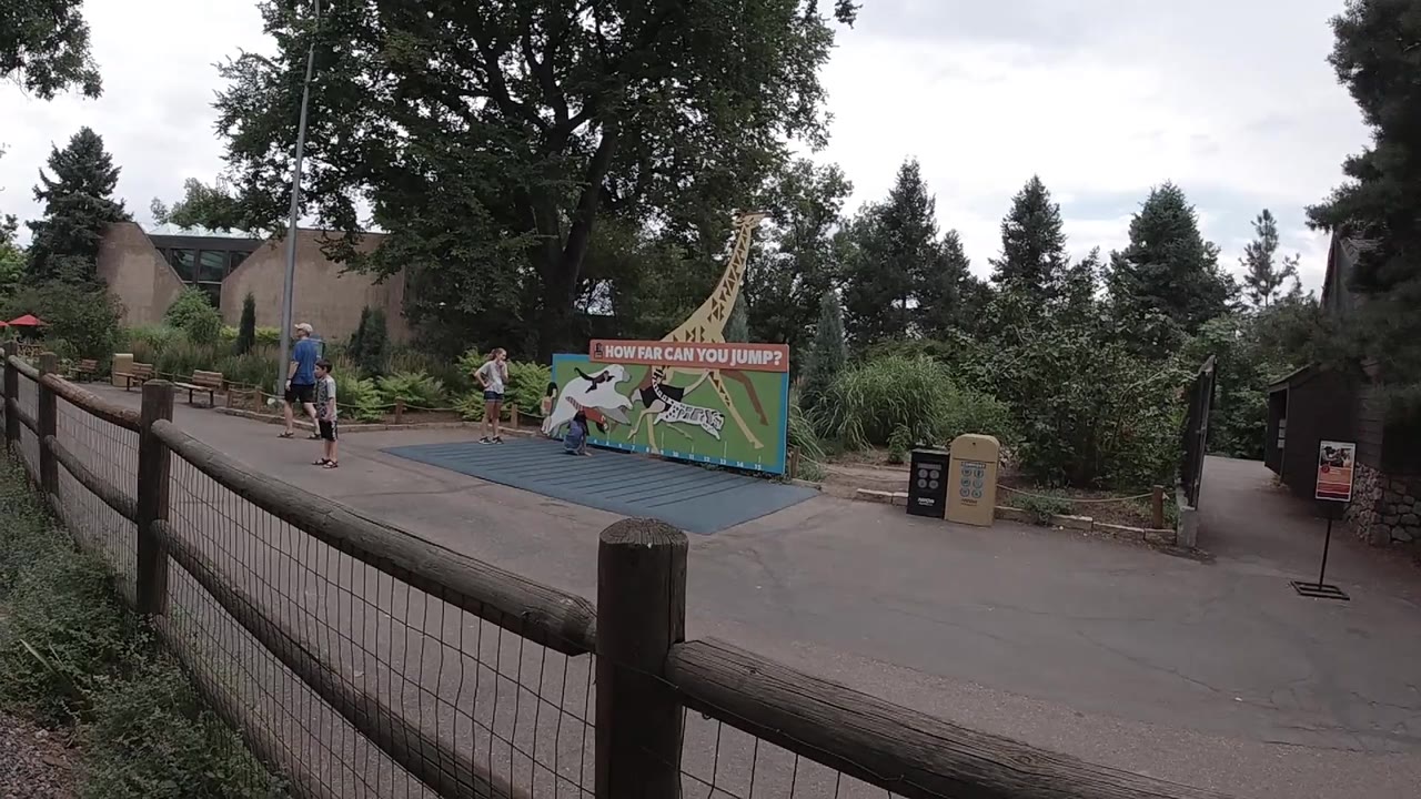 Man walking near zoo play area