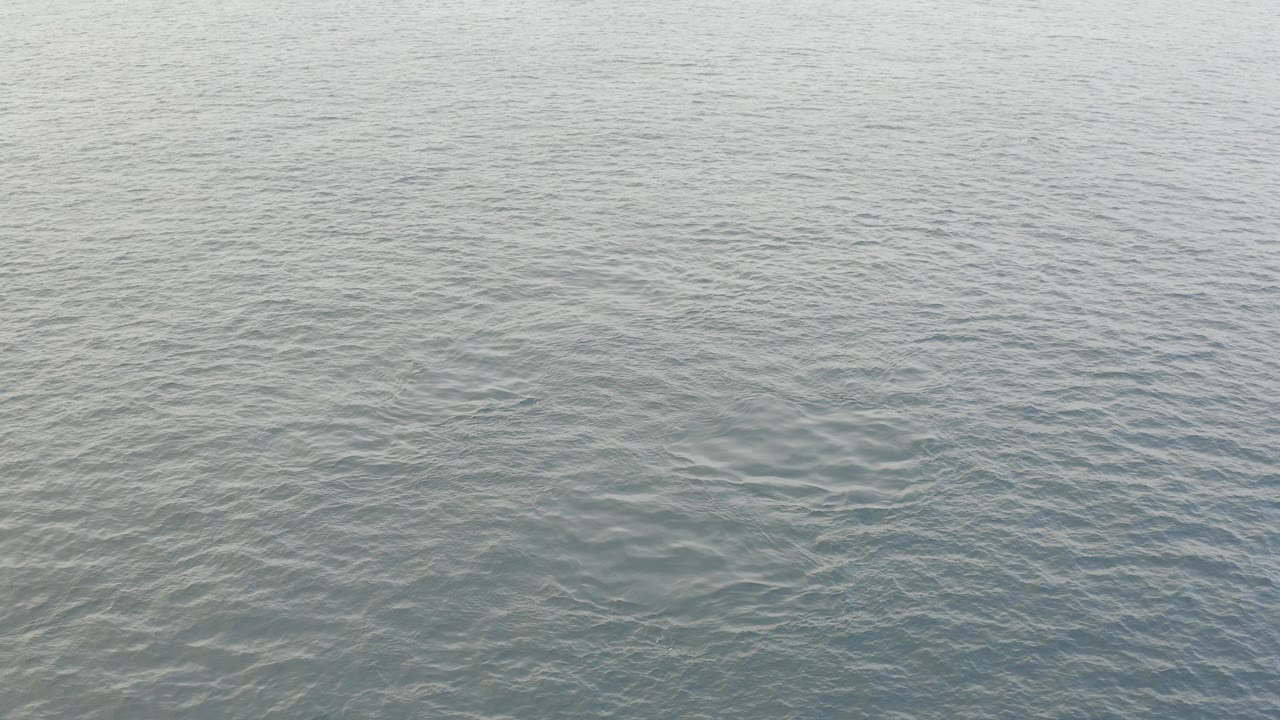 Blue-gray ocean water fills the frame in Baja California Sur, Mexico, with fine surface ripples and no visible people.