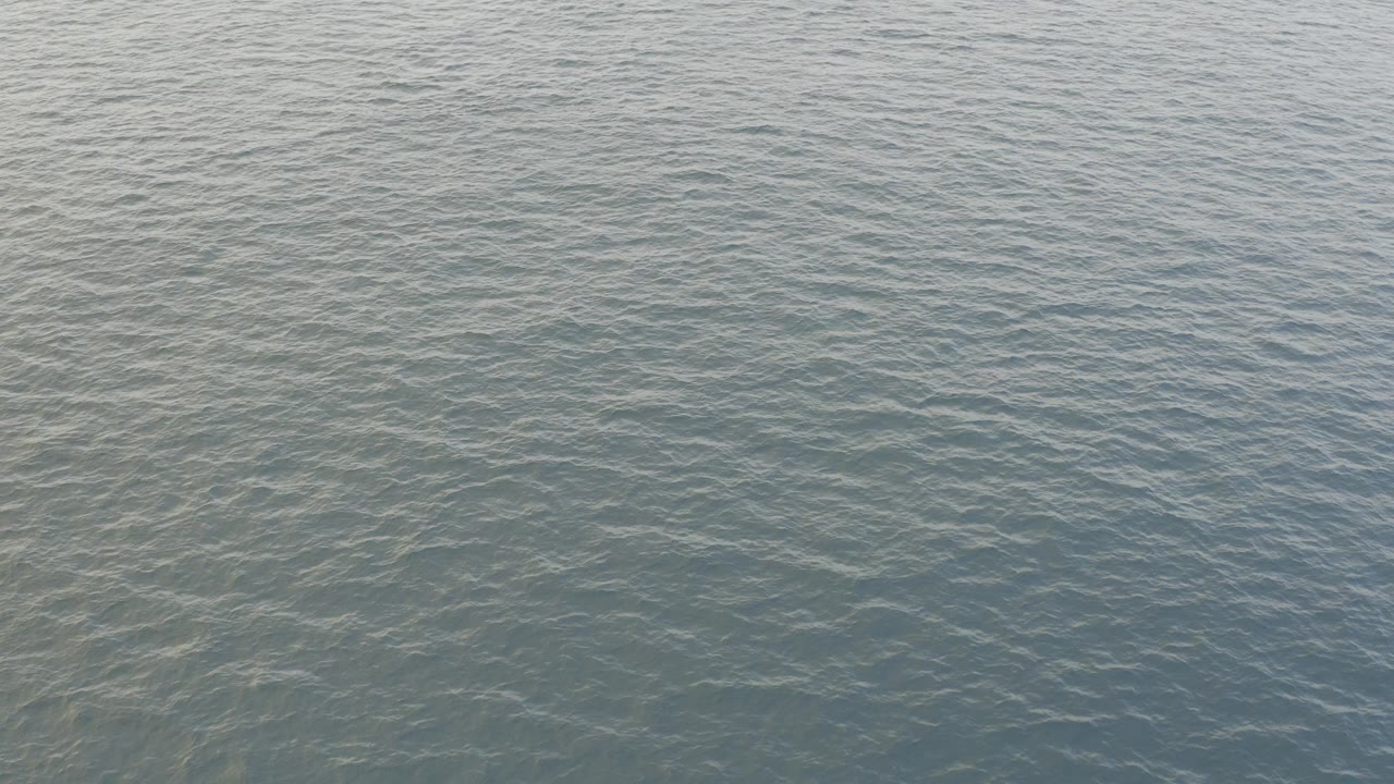 Blue green ocean surface seen from above
