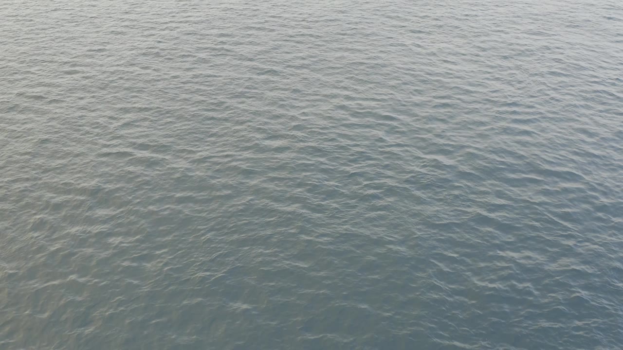The third frame shows Baja California Sur ocean surface with faint diagonal wave bands, muted blue-green water, and no visible people.