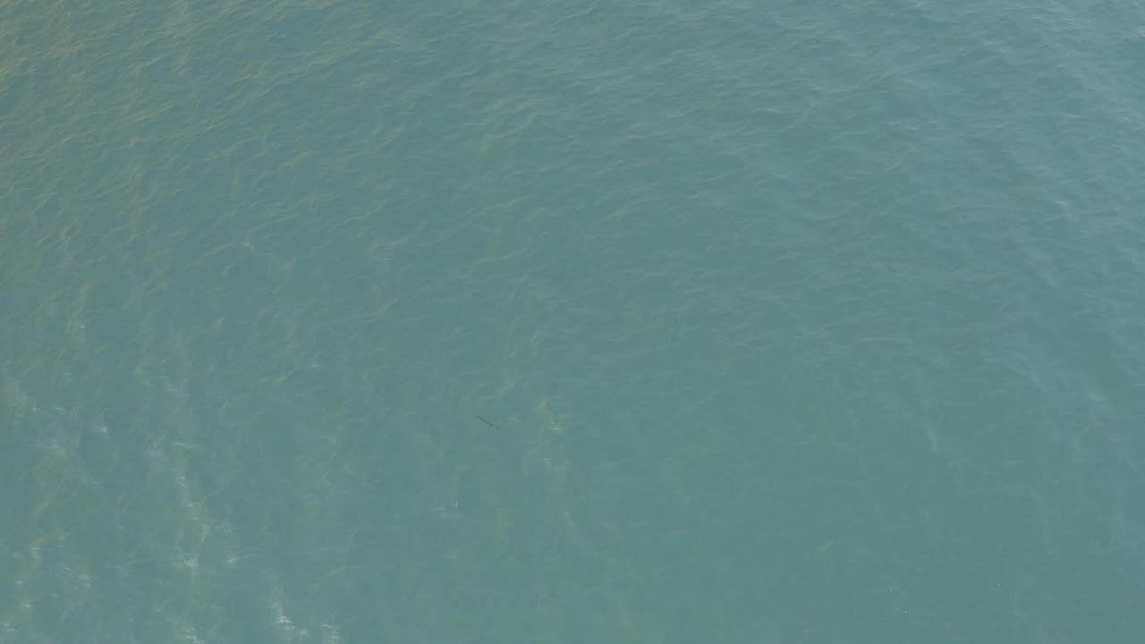 Calm aquamarine ocean surface in Baja California Sur, Mexico, shown without shoreline, vessels, or visible people.