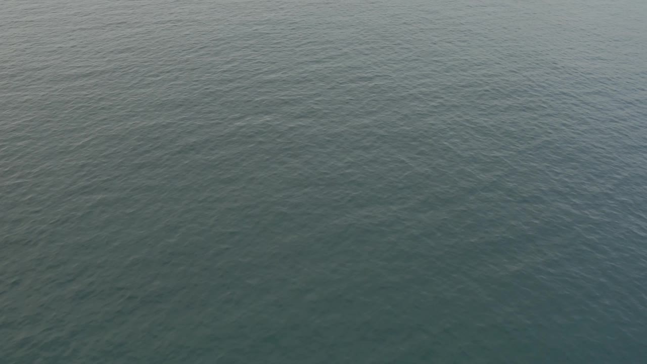 High-angle Baja California Sur water view with the beach mostly out of frame and no visible people, boats, or structures.