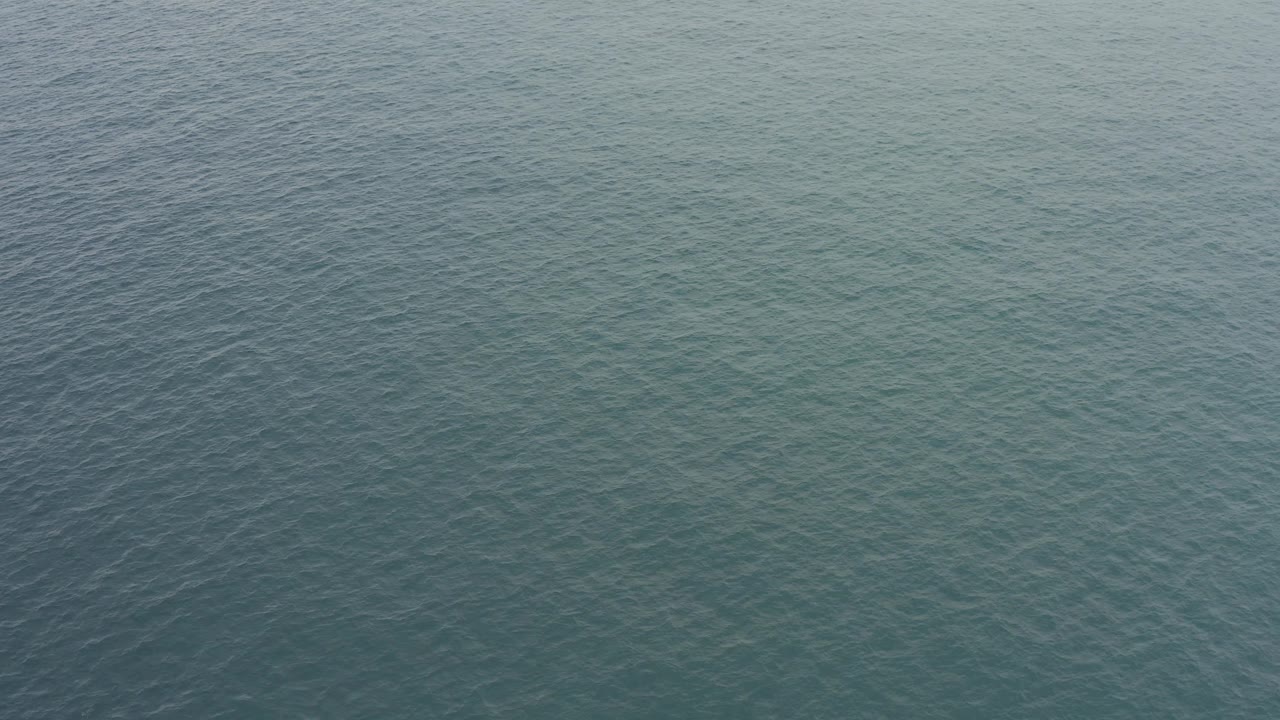 Blue-green ocean surface in Baja California Sur, Mexico, filling the frame with small overlapping ripples and no visible people.