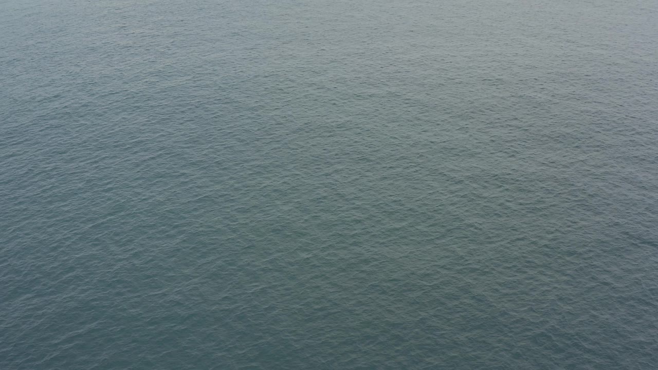 Blue green ocean water fills the frame in Baja California Sur, Mexico, with fine surface ripples and no visible people.