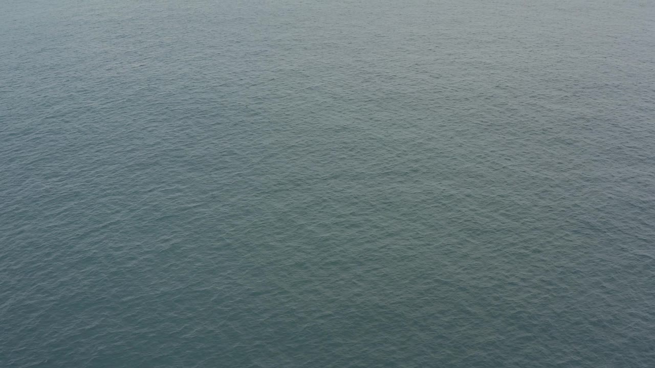 Aerial-looking view over rippled sea water in Baja California Sur, Mexico, with only water visible and no visible people.