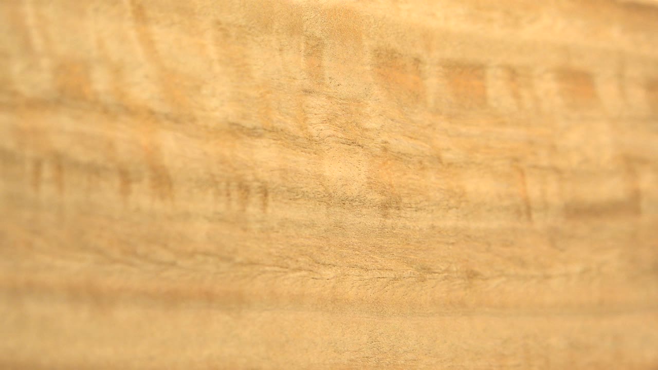 Wide close-up of tan textured surface