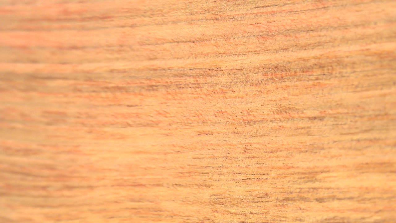 Brown board surface with softer focus at right