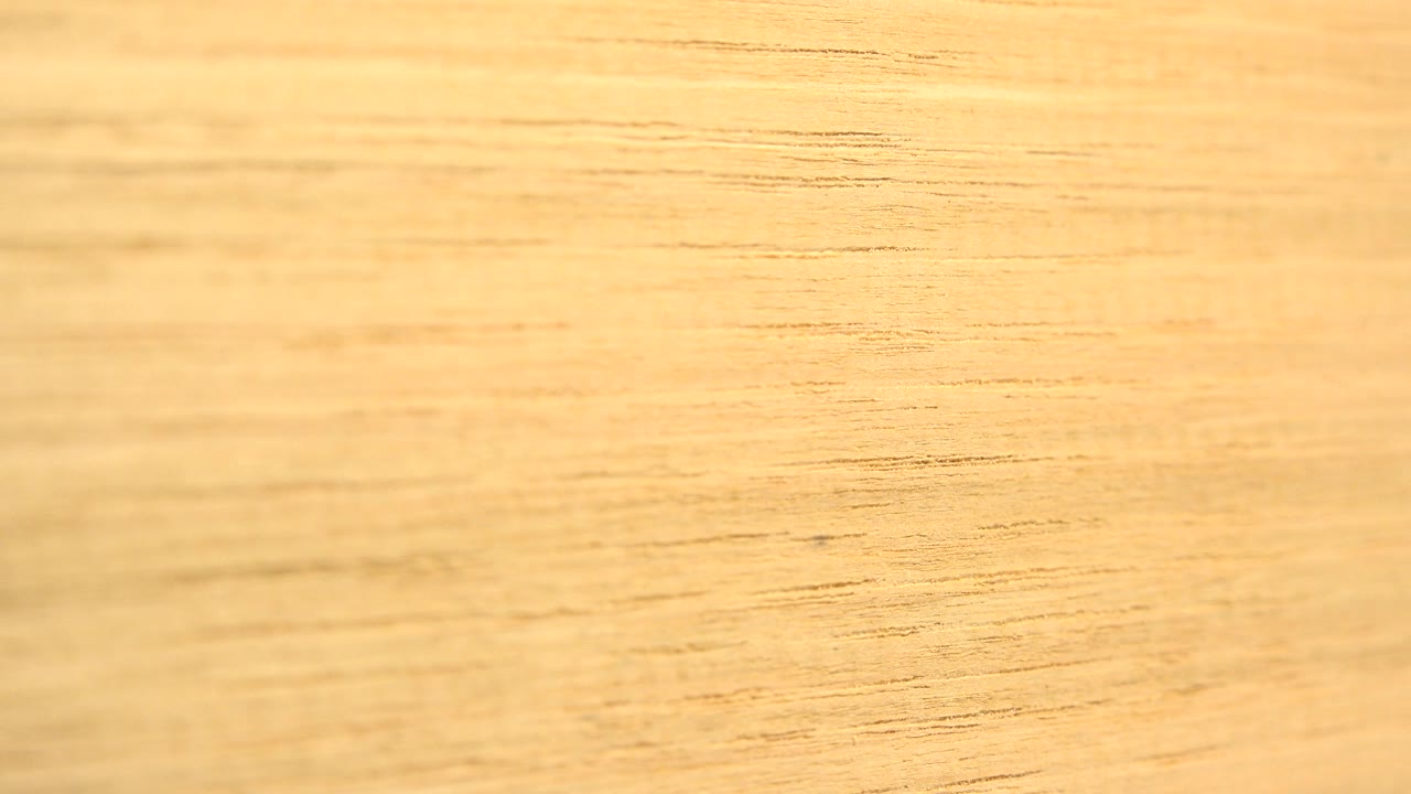 Wood grain close-up across the full frame