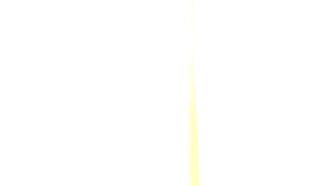 Mostly white overexposed area beside a strip of yellow plywood.