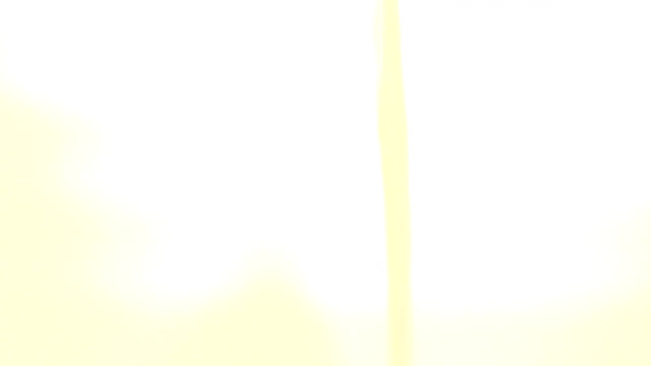 Mostly white frame with a pale yellow vertical edge.