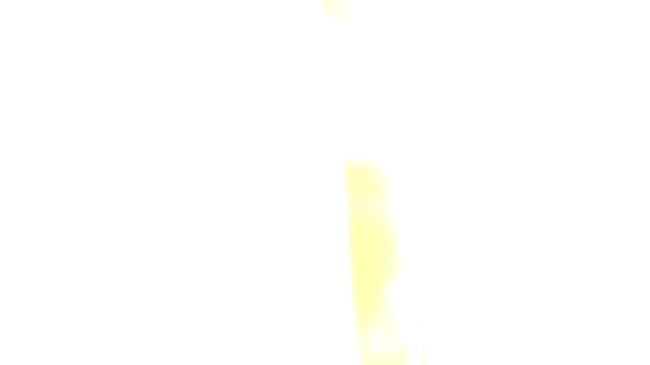 Close frame of warm brown wood grain in Westminster, Colorado footage with a bright white-yellow band along the upper edge and no visible people.