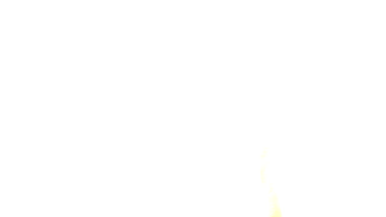 Mostly white overexposed frame with faint yellow glow at the bottom.