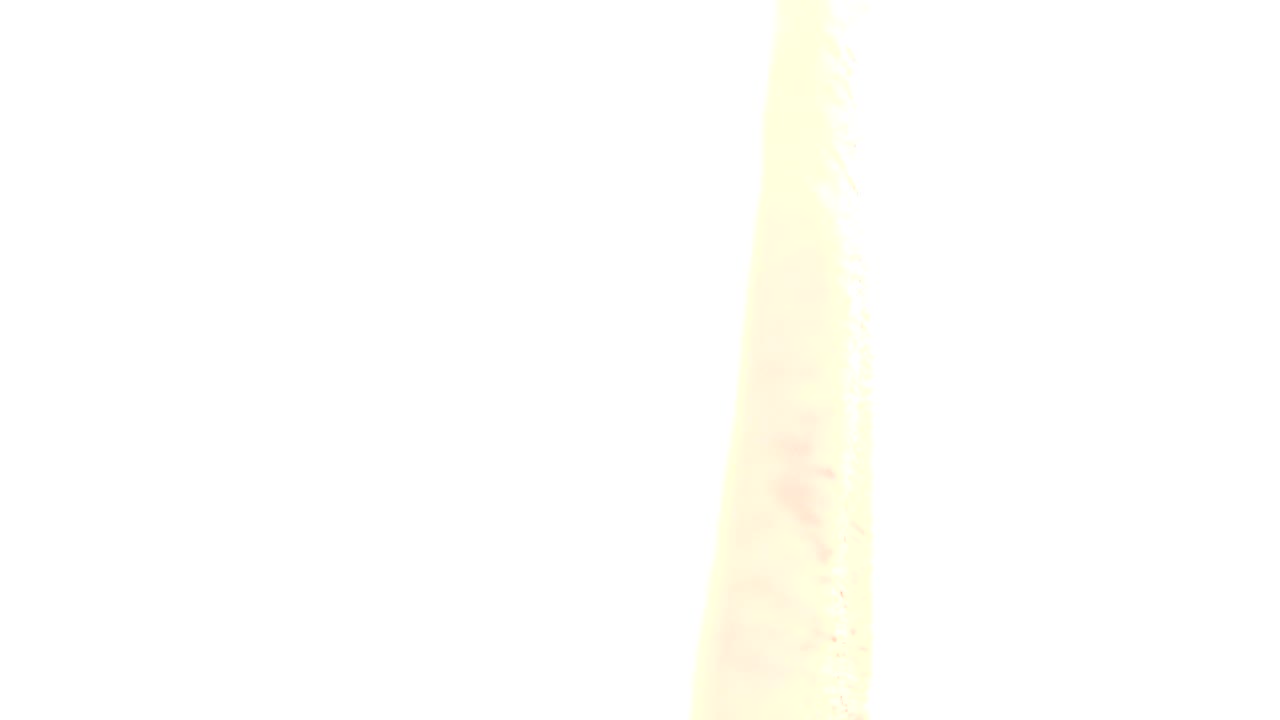 Opening frame in Westminster, Colorado shows mostly overexposed white wall with a narrow pink-toned wooden edge near center, no visible people.