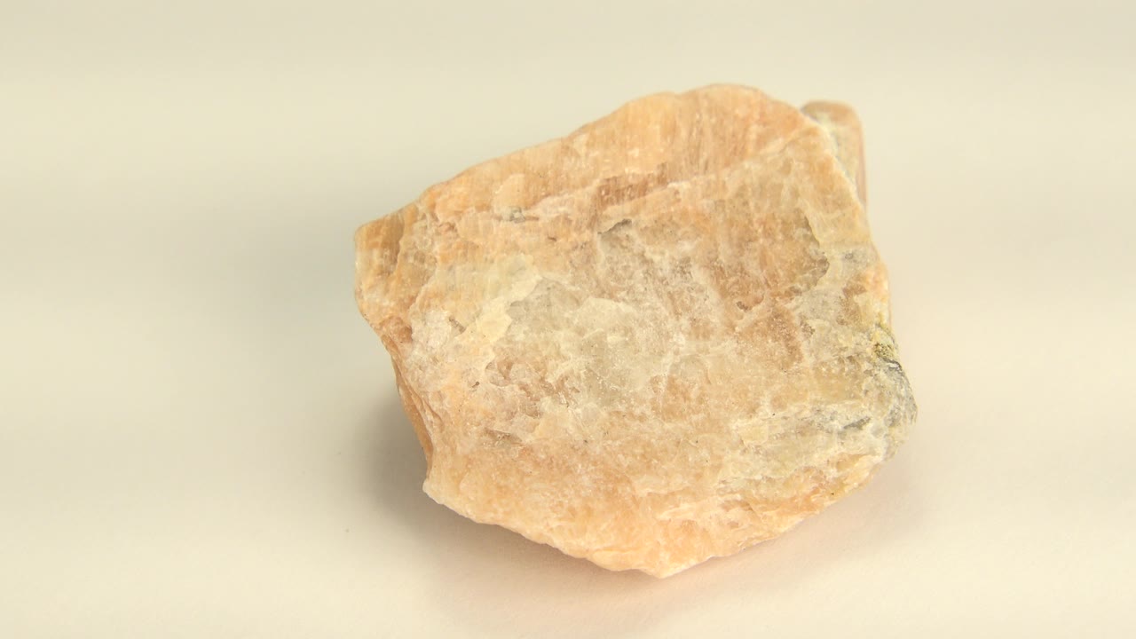 Orange rock on a pale tabletop