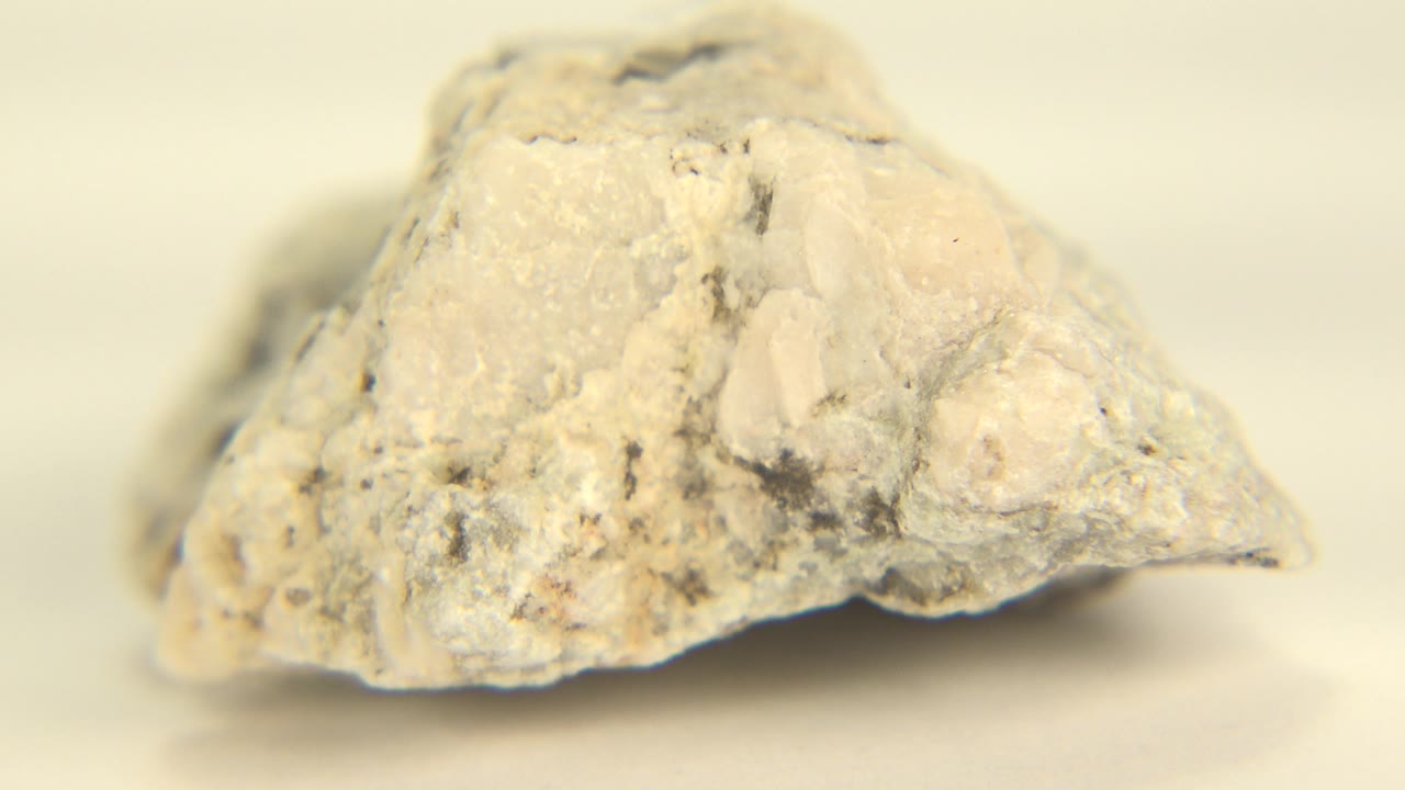 Angled view of rough pale rock