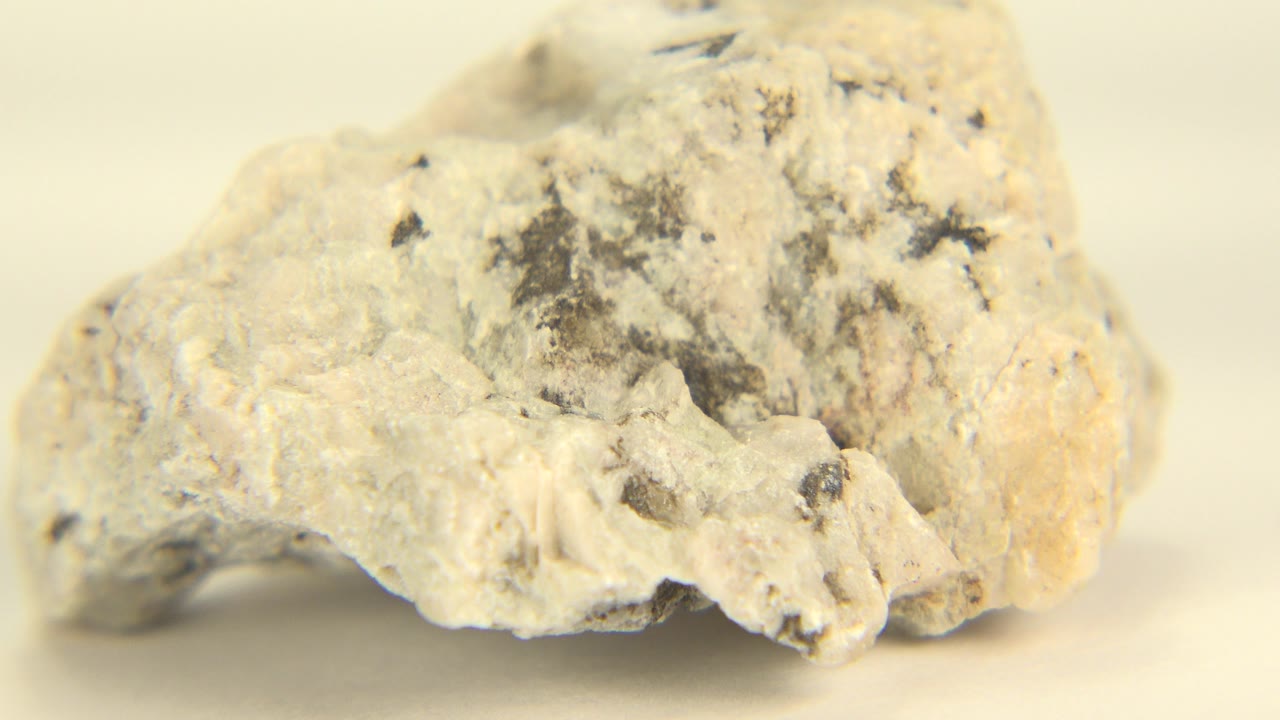 White rock close-up on a pale surface