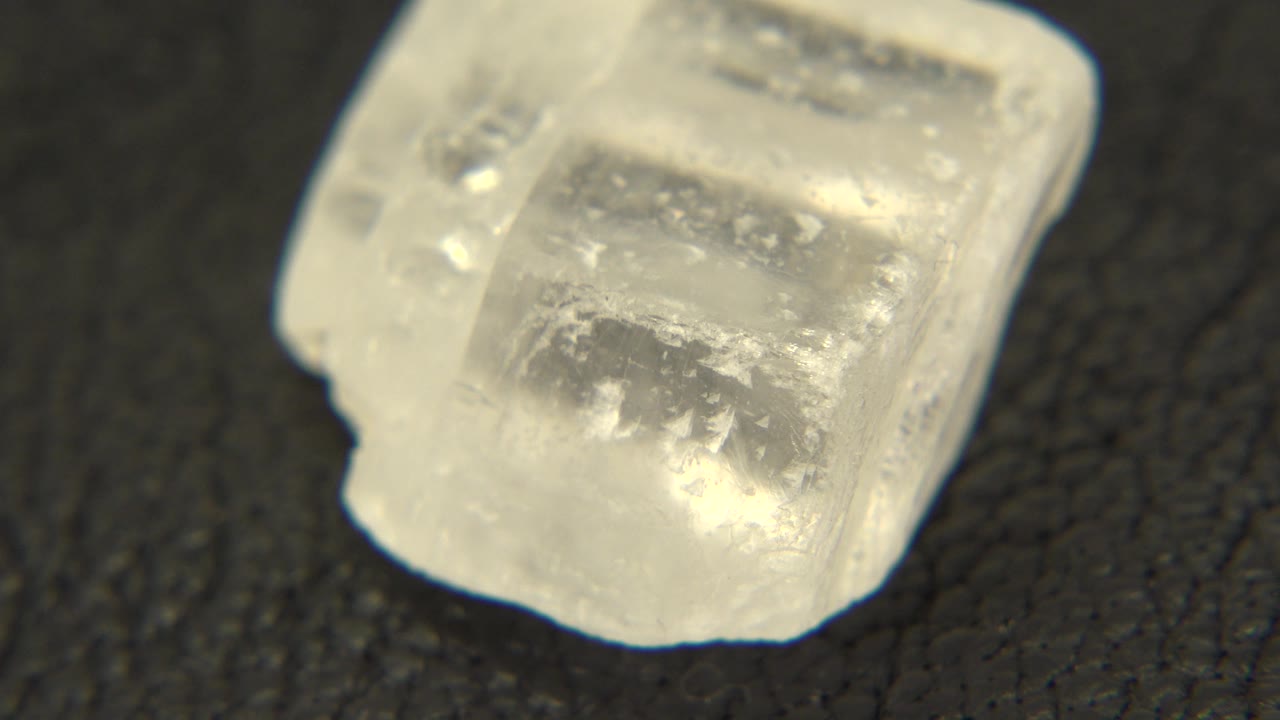 Quartz rock with square-like face and bright edge.