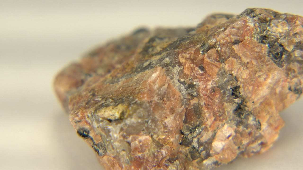Spinning rock turned to a wider rough face