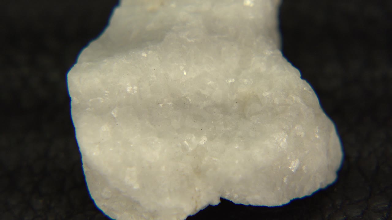 Irregular pale rock with rough edge