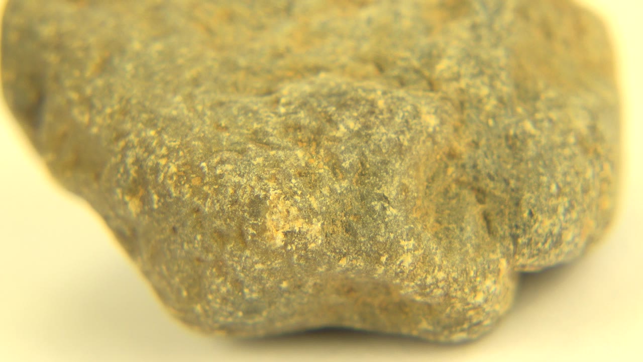 Closer view of the rock surface with a protruding lower edge.