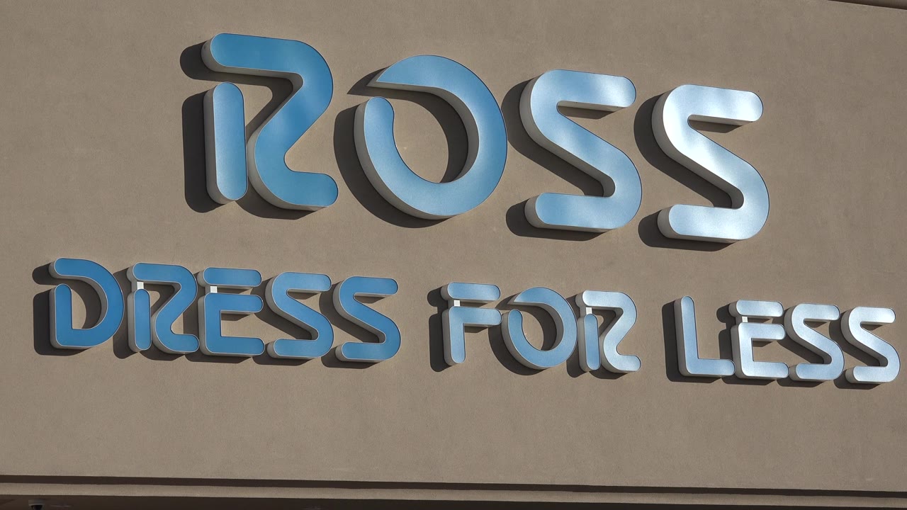 Ross Dress for Less sign against a tan building exterior.