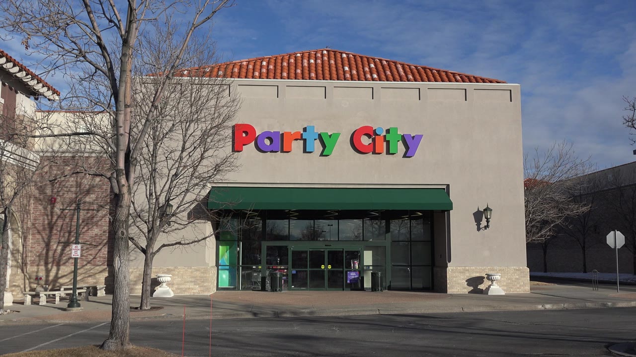 Party City storefront across an empty parking lot.