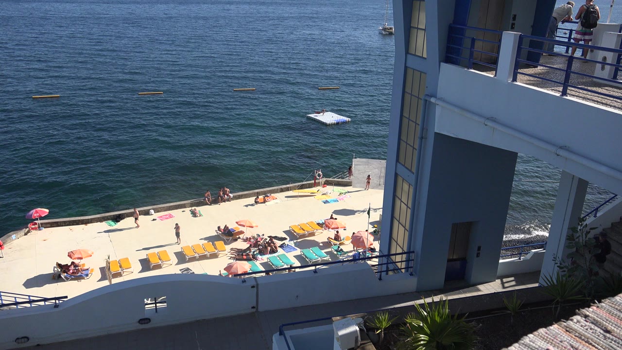 Elevated view of resort sun terrace beside the ocean
