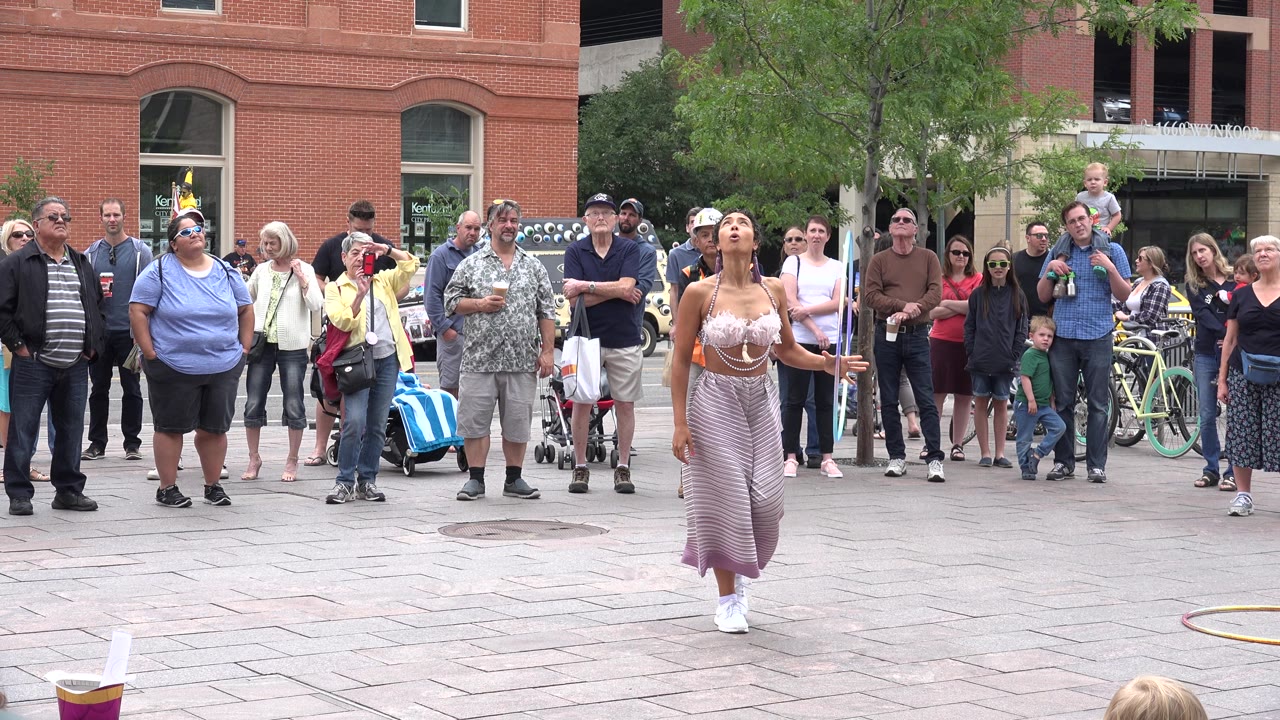 Performer looks upward during a hoop trick.