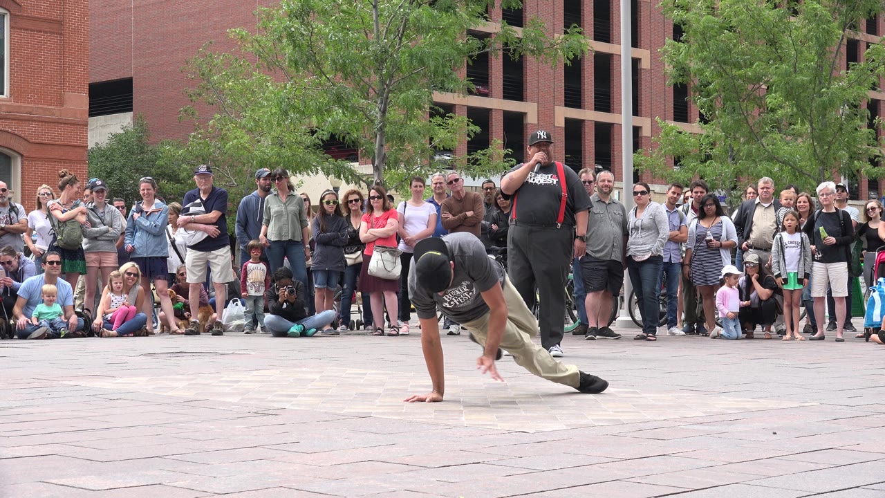 Dancer shifts weight forward during a floor move.