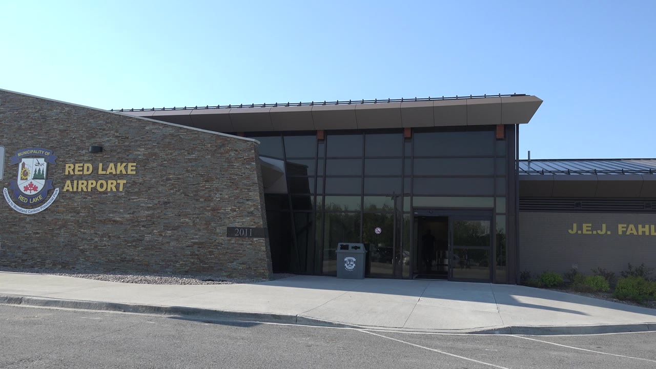 Terminal frontage with Red Lake Airport sign and partial J.E.J. Fahlgren lettering