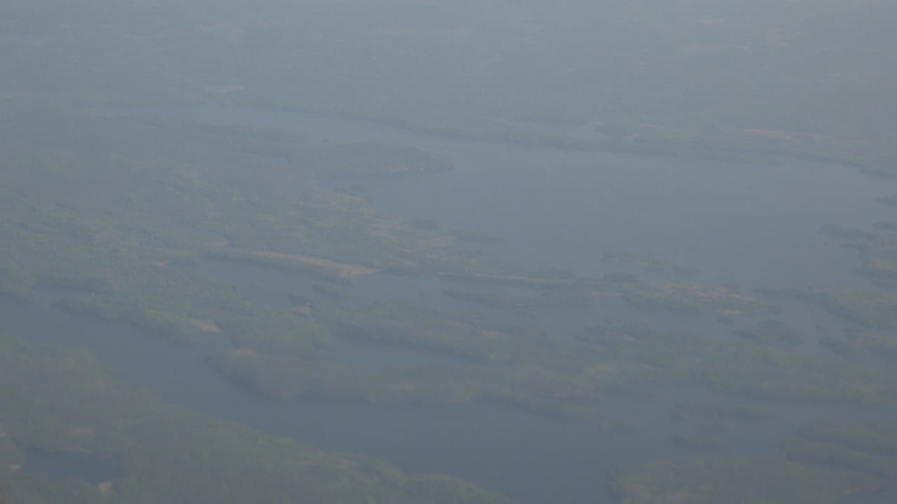 Muted aerial panorama of water and land