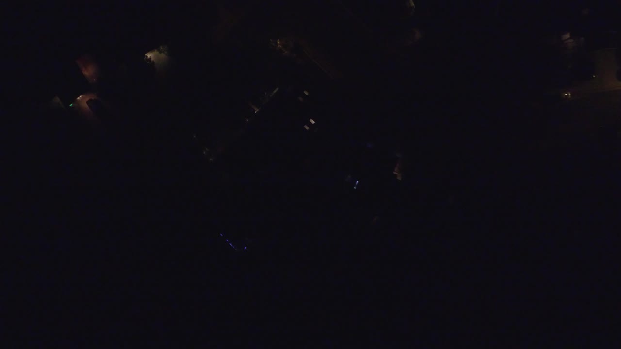 Opening frame of Hidden Lake, Colorado from above at night, with scattered faint lights and no visible people.