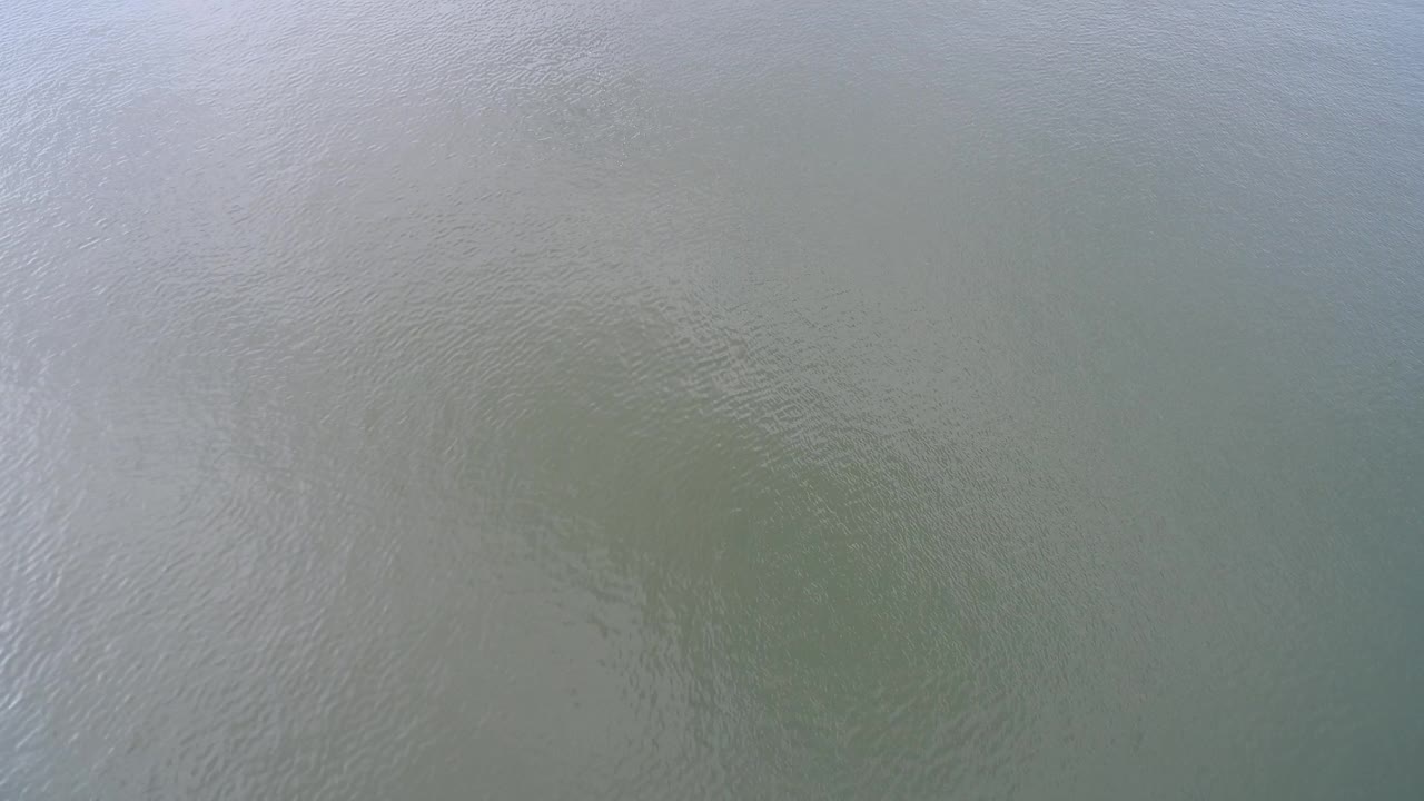 Muted lake water with fine surface texture