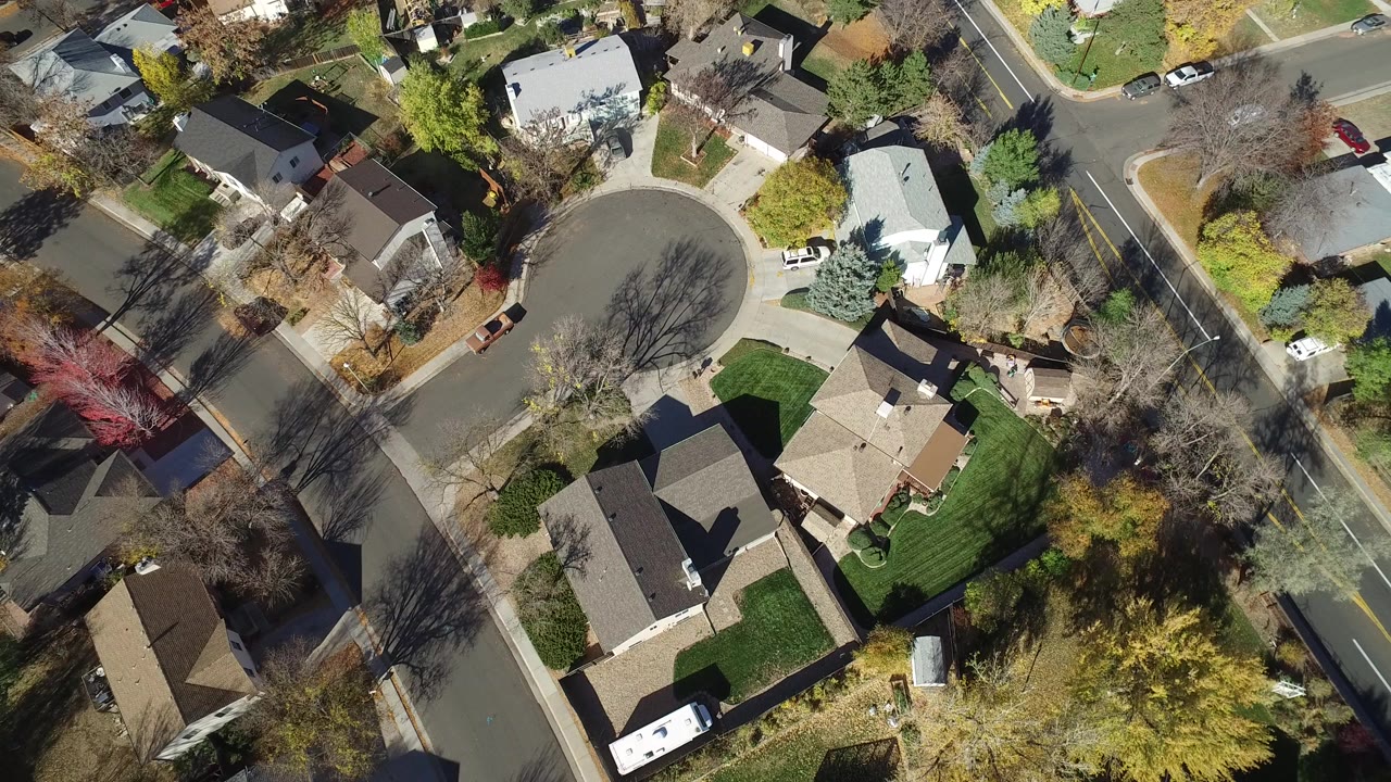 Overhead view of suburban houses and curved streets