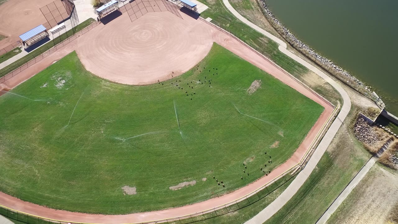 Baseball field and shoreline seen from directly above.