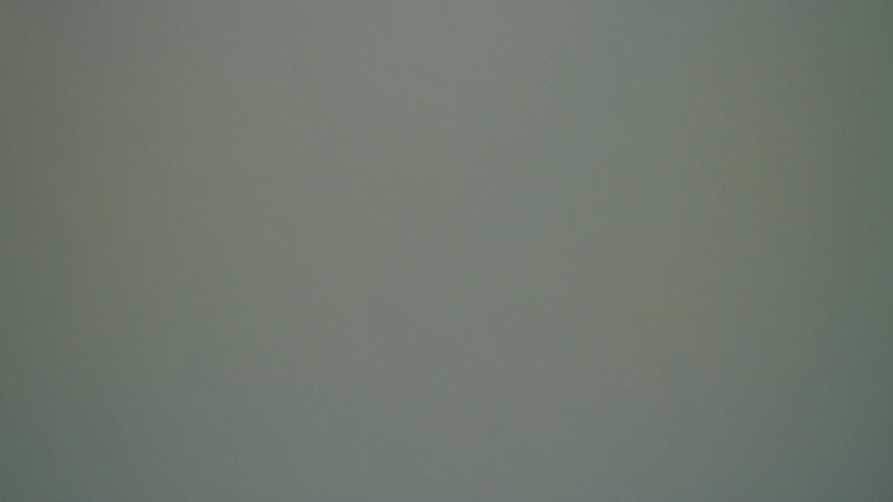 At one second, the Hidden Lake Colorado footage remains a flat gray screen with faint tonal patches and no visible people.