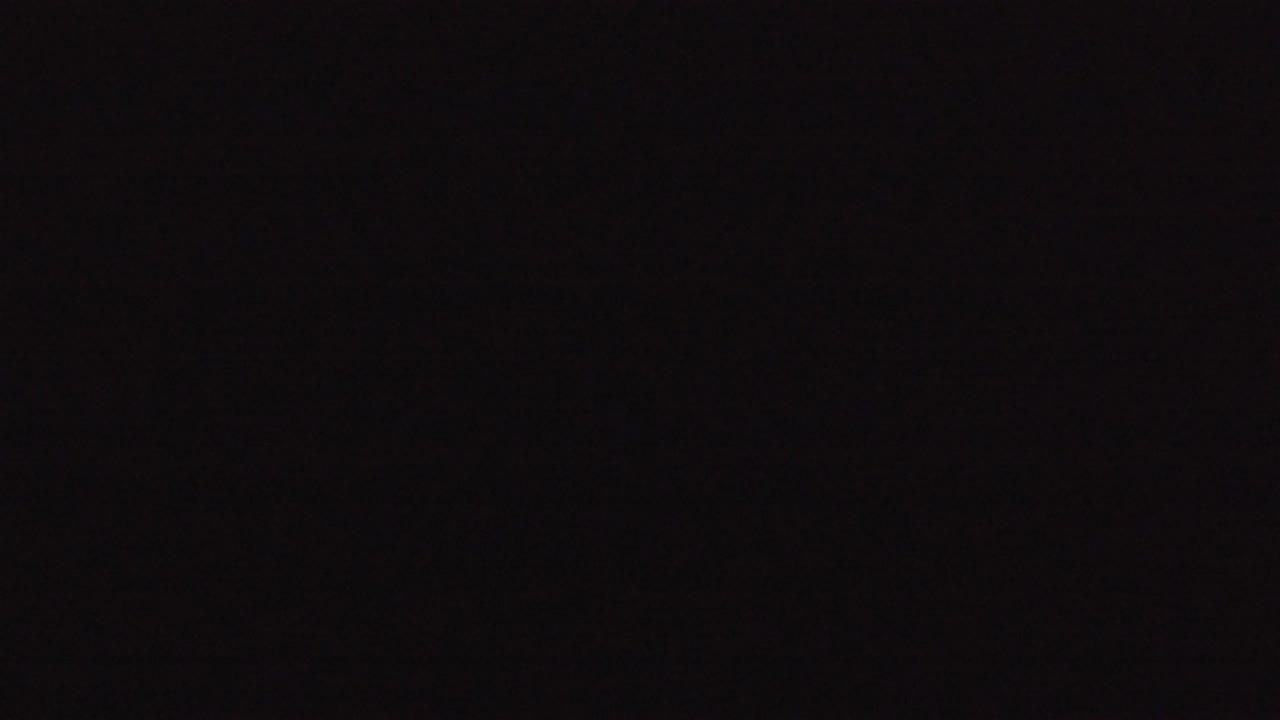 At 0:00, the Denver 2016 frame is almost entirely black with slight brown shadow variation and no visible people.