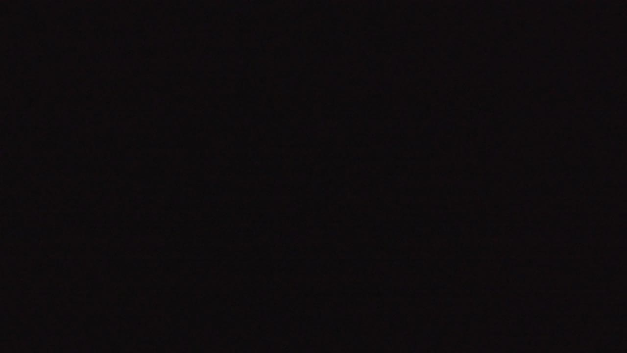 Second frame from the Denver 2016 clip remains almost fully black, with only subtle sensor noise visible and no visible people.