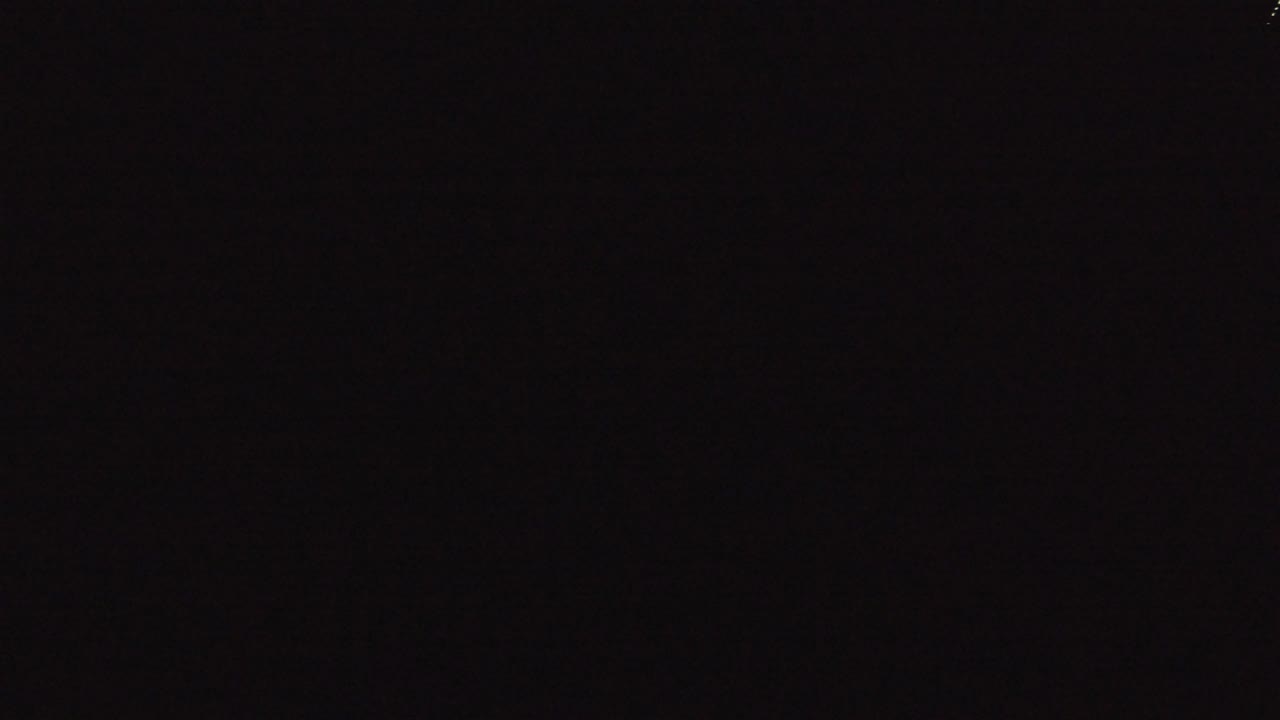 Nearly black opening frame from the Denver, Colorado 2016 clip with no visible people and no readable scene details.