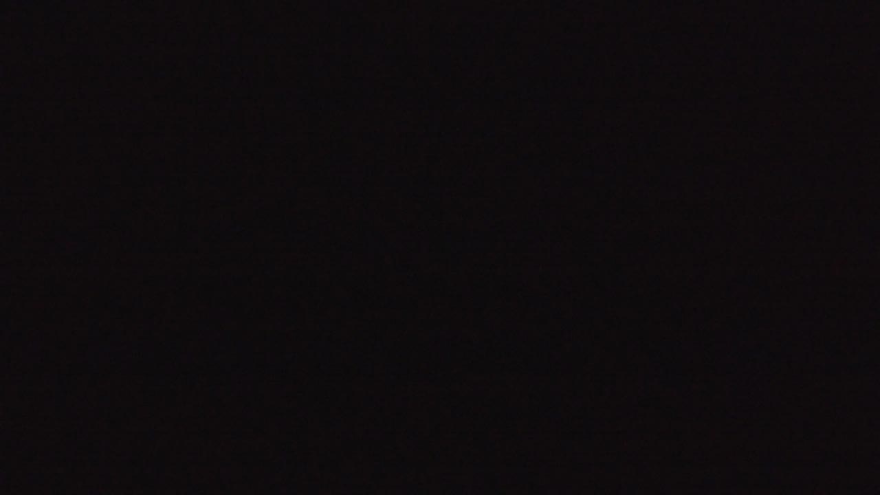 Second frame from the Denver 2016 clip remains almost completely black, with no visible people or identifiable objects.