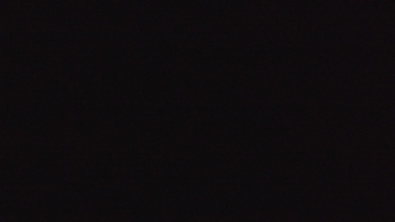 At 0:00, the Denver clip opens on a nearly black frame with faint shadow gradients and no visible people.