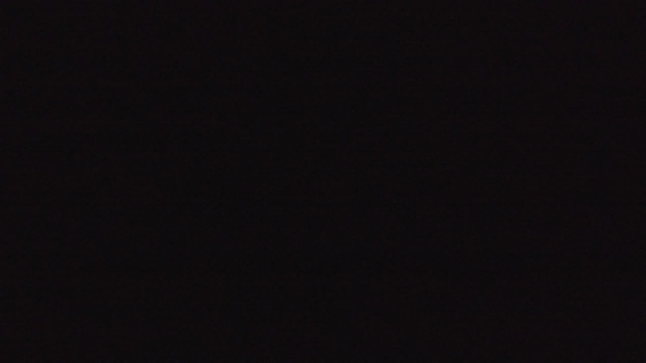 At one second, the Denver 2016 footage remains almost fully black with no readable objects and no visible people.