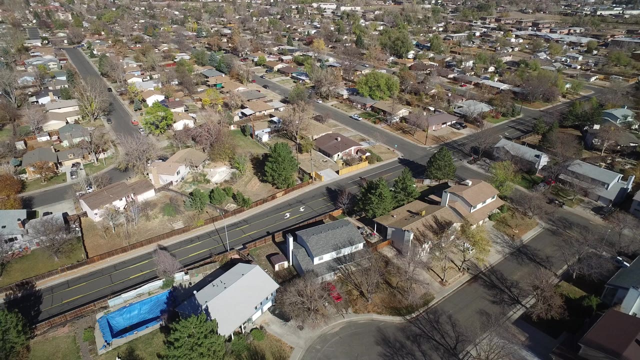 Aerial view of suburban homes and intersecting streets.