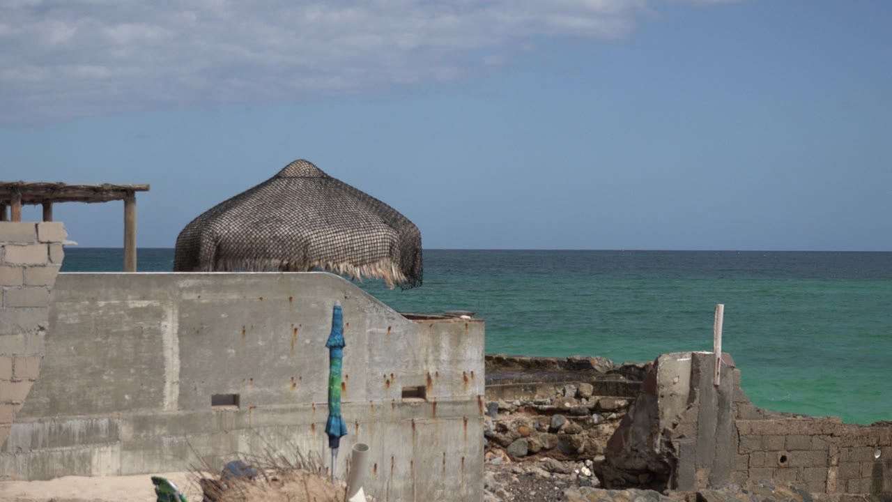 Coastal construction materials with sea and horizon behind
