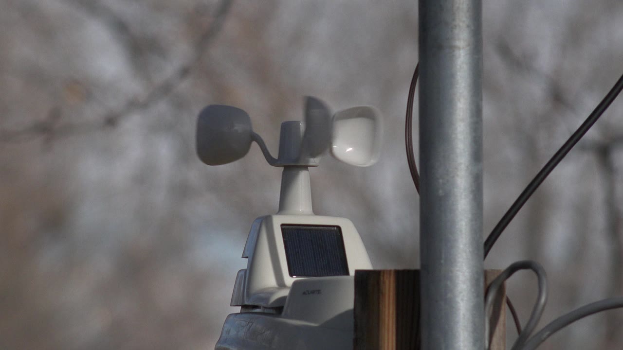 Weather station wind cups with one pale cup facing camera