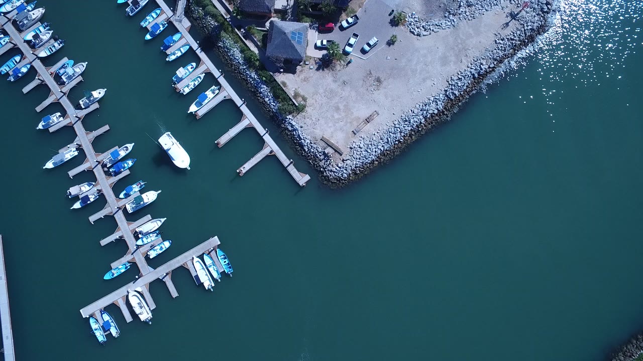 Overhead harbor view with boats tied to docks