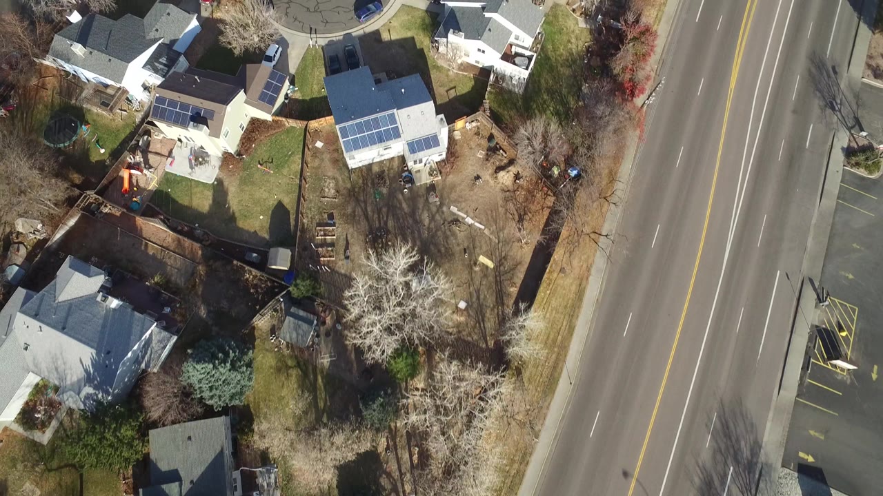 Suburban homes and yards viewed from directly above.