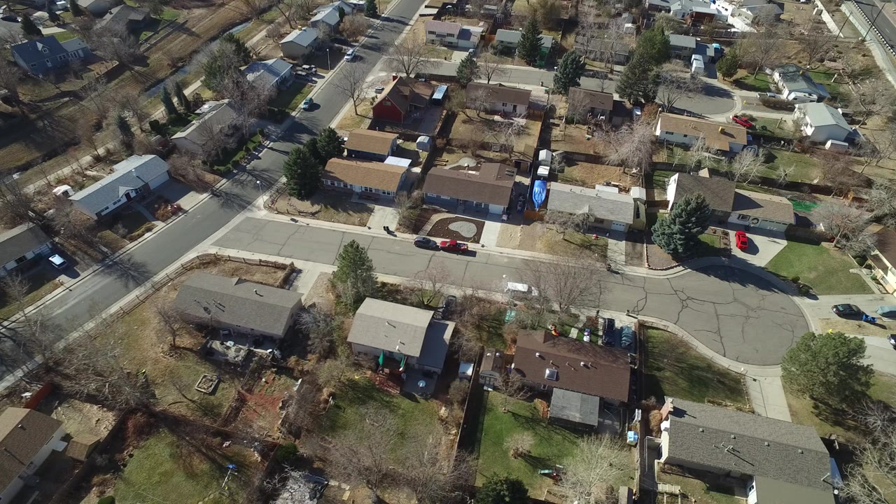 Aerial view of suburban homes and curved streets
