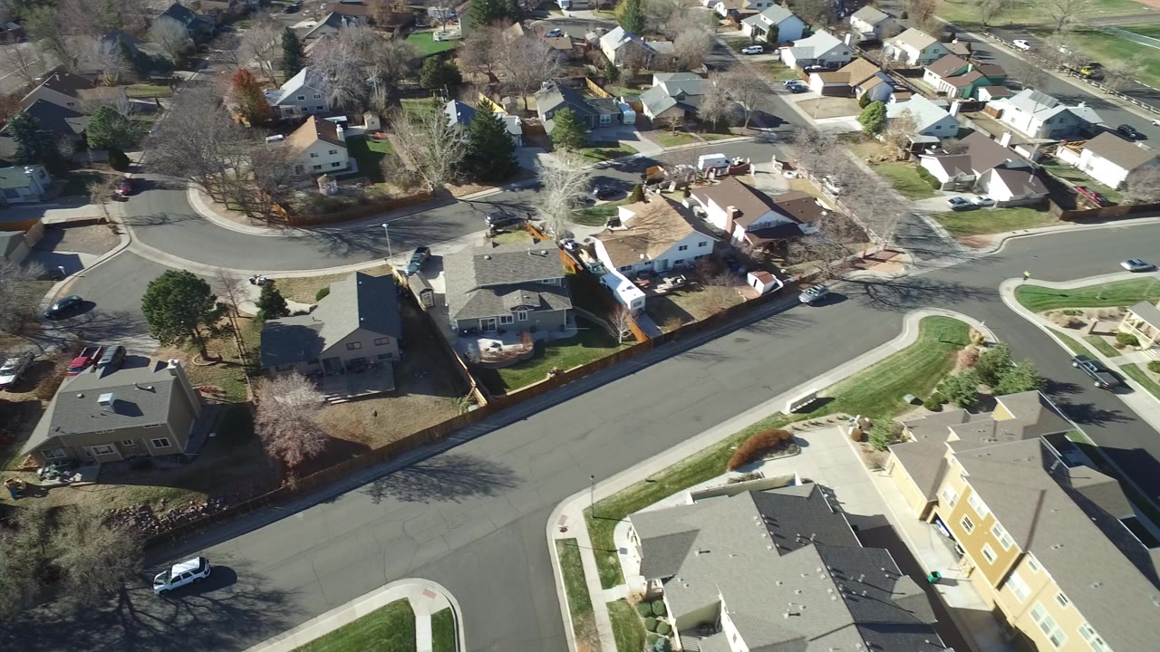 Aerial view of curved residential streets and homes