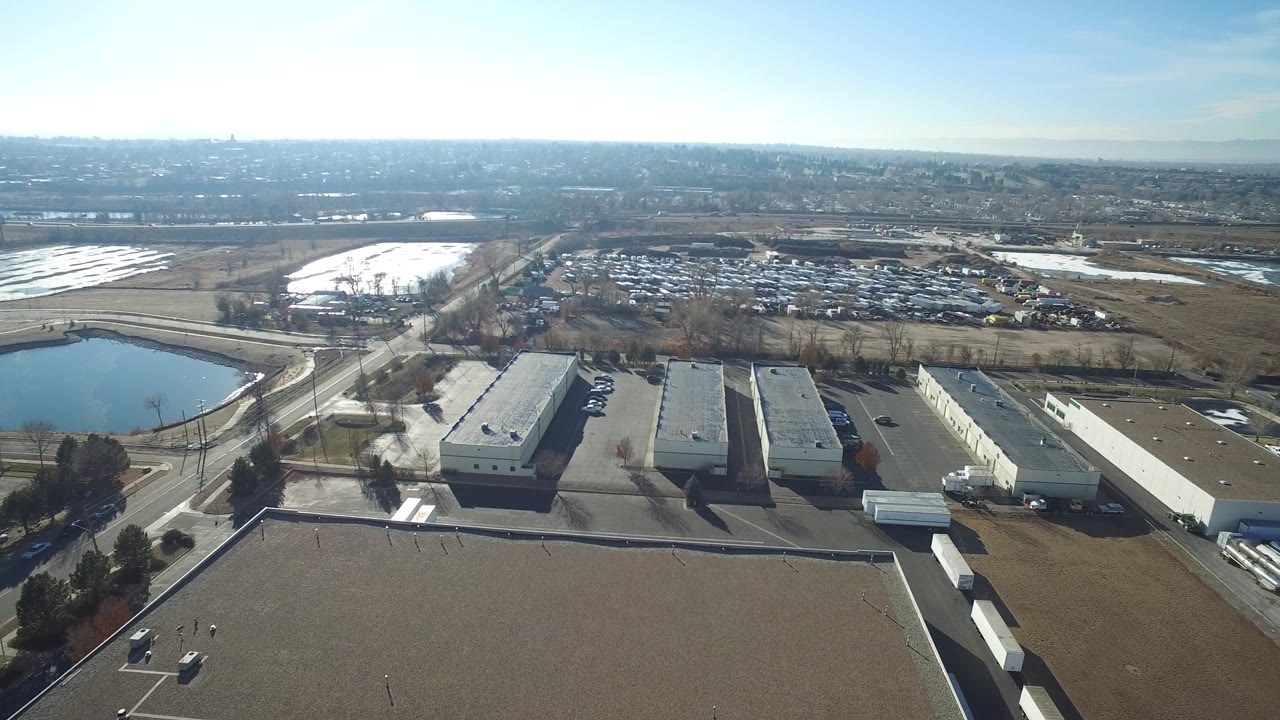 Industrial buildings and parking areas viewed from above